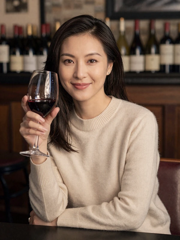 Dr. Mira Chen, single nephrologist on a doctor dating site, Boston wine bar portrait